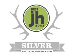 Best of Jackson Hole 2023 silver award emblem featuring antlers and a circular logo.